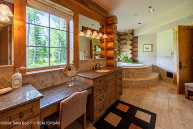 Set on the Snake River with 42.57 acres & dramatic Teton views