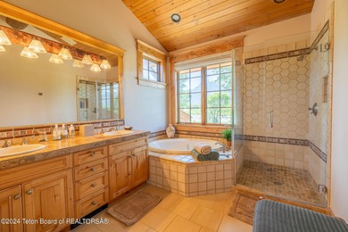 Set on the Snake River with 42.57 acres & dramatic Teton views