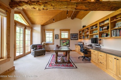 Set on the Snake River with 42.57 acres & dramatic Teton views