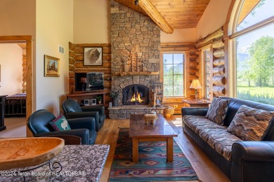 Set on the Snake River with 42.57 acres & dramatic Teton views