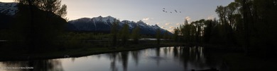 Set on the Snake River with 42.57 acres & dramatic Teton views