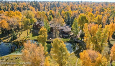 Set on the Snake River with 42.57 acres & dramatic Teton views