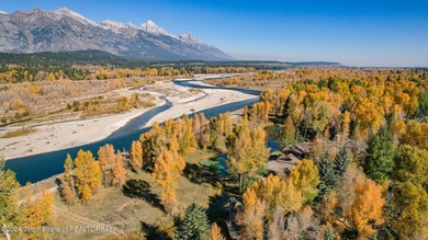 Set on the Snake River with 42.57 acres & dramatic Teton views