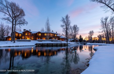 Set on the Snake River with 42.57 acres & dramatic Teton views