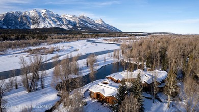 Set on the Snake River with 42.57 acres & dramatic Teton views
