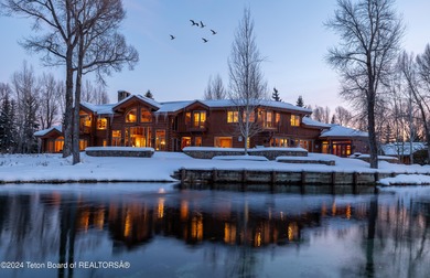 Set on the Snake River with 42.57 acres & dramatic Teton views