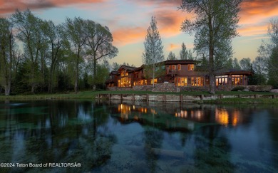 Set on the Snake River with 42.57 acres & dramatic Teton views