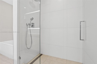 Soaring high on the 25th floor, this sought-after Line 04 unit