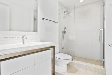 Soaring high on the 25th floor, this sought-after Line 04 unit