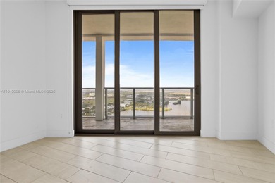 Soaring high on the 25th floor, this sought-after Line 04 unit