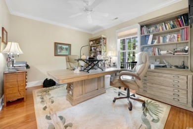 Nestled on a serene 1.88 acre wooded lot, enjoy resort-style