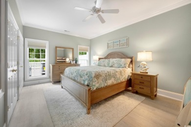 Nestled on a serene 1.88 acre wooded lot, enjoy resort-style