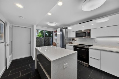 RESORT STYLE, BOUTIQUE CONDO FEATURES ASSIGNED BOAT DOCK FOR