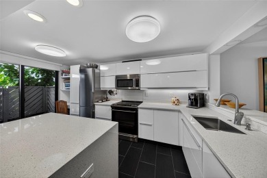 RESORT STYLE, BOUTIQUE CONDO FEATURES ASSIGNED BOAT DOCK FOR