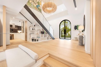 Discover this stunning two-story home in the prestigious Hammock