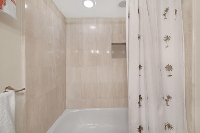 Middle floor Harbour House unit with Marina, bay and Ocean views