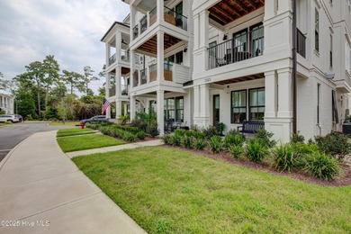 This luxurious townhome in Riverlights Marina Village was built