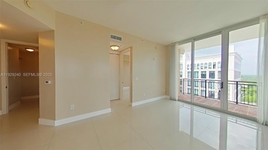 Amazing views from this corner unit in the heart of Coral Gables