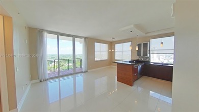 Amazing views from this corner unit in the heart of Coral Gables