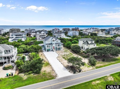 Welcome to 913 Whalehead Drive, a beautifully maintained