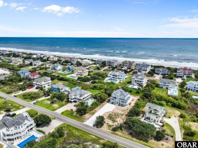 Welcome to 913 Whalehead Drive, a beautifully maintained