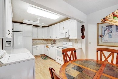 Beautiful second floor unit overlooking the tranquil lake, unit