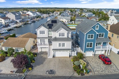 This meticulous waterfront stunner will take your breath away!