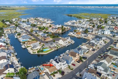 This meticulous waterfront stunner will take your breath away!