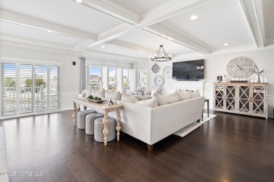 This meticulous waterfront stunner will take your breath away!