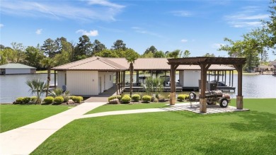 Welcome to the pinnacle of luxury lakefront living on nearly 2