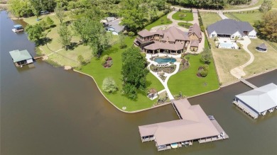 Welcome to the pinnacle of luxury lakefront living on nearly 2
