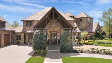 Welcome to the pinnacle of luxury lakefront living on nearly 2