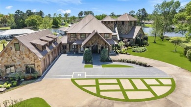 Welcome to the pinnacle of luxury lakefront living on nearly 2