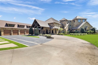 Welcome to the pinnacle of luxury lakefront living on nearly 2
