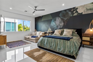 Completed in 2022, this 4-level townhome in