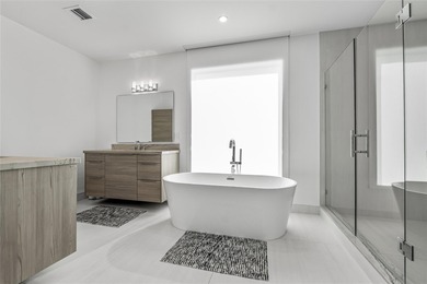 Completed in 2022, this 4-level townhome in