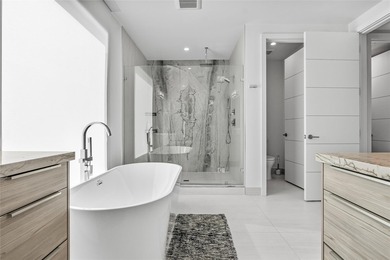 Completed in 2022, this 4-level townhome in