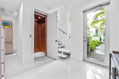 Completed in 2022, this 4-level townhome in