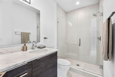 Completed in 2022, this 4-level townhome in