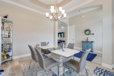 Nestled within the gated Dolphin Bay community, 906 Dolphin