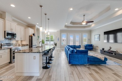 Nestled within the gated Dolphin Bay community, 906 Dolphin