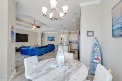 Nestled within the gated Dolphin Bay community, 906 Dolphin