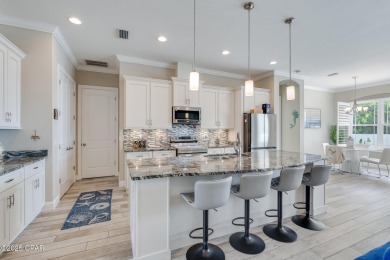 Nestled within the gated Dolphin Bay community, 906 Dolphin