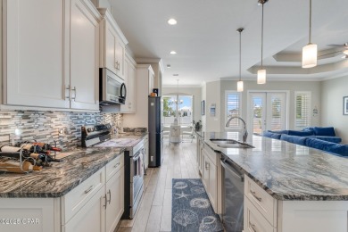 Nestled within the gated Dolphin Bay community, 906 Dolphin