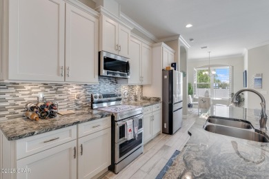 Nestled within the gated Dolphin Bay community, 906 Dolphin