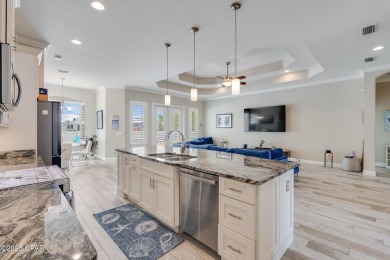 Nestled within the gated Dolphin Bay community, 906 Dolphin