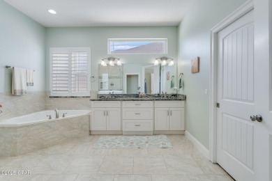 Nestled within the gated Dolphin Bay community, 906 Dolphin