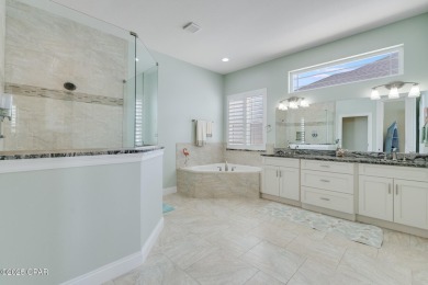 Nestled within the gated Dolphin Bay community, 906 Dolphin