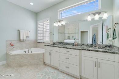 Nestled within the gated Dolphin Bay community, 906 Dolphin