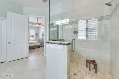 Nestled within the gated Dolphin Bay community, 906 Dolphin